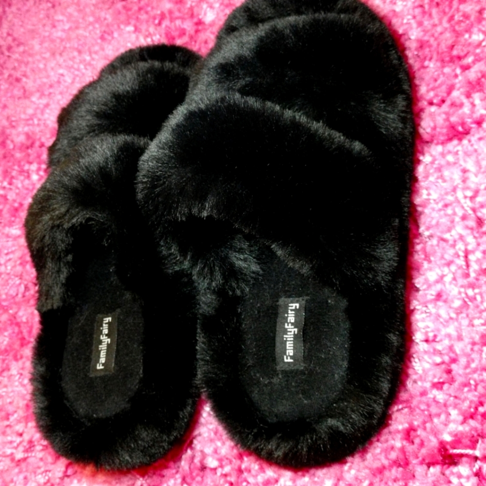 Black furry slippers